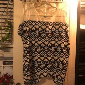 Tribal style top with open back. Thin material